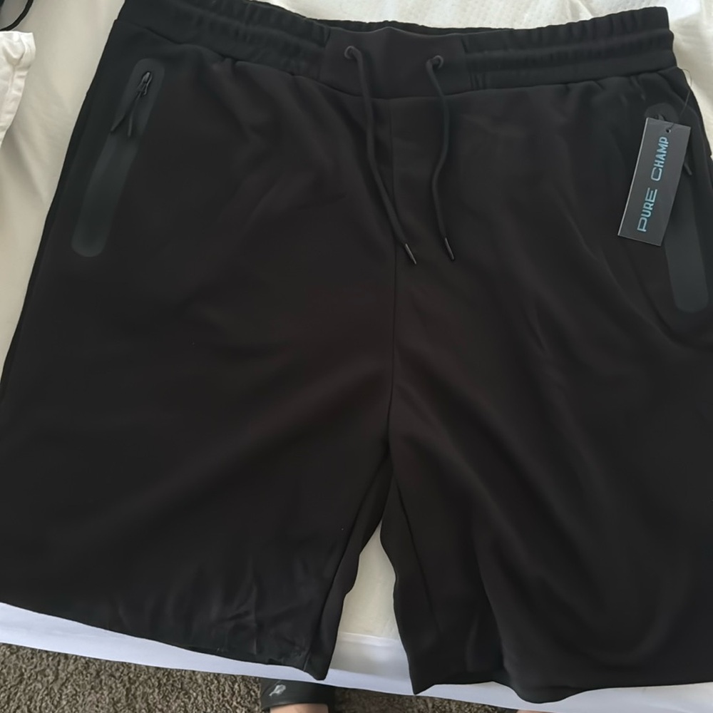 Pure champ shorts grey ones are xxxl and black or xxl